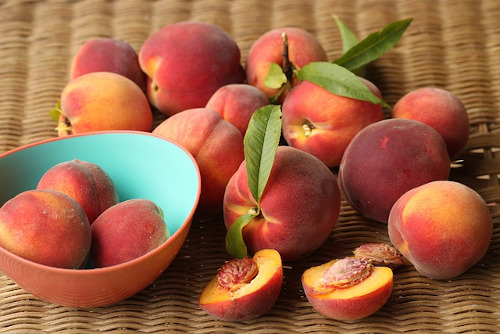 Hear healthy foods list: Image of peaches on a table.