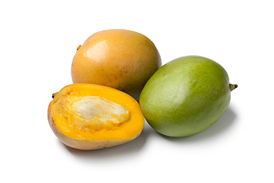 three mangoes with one cut open