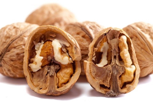 Foods good for the heart: Image of heart healthy walnuts.