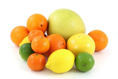 Fruits for fever and cold: Image of different citrus fruits.