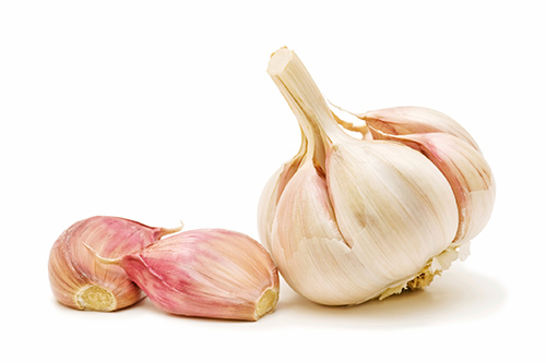 Garlic bulbs waiting to be used as a remedy for cold and flu