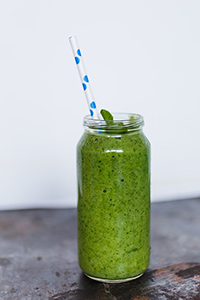 Glass of cabbage juice on a table