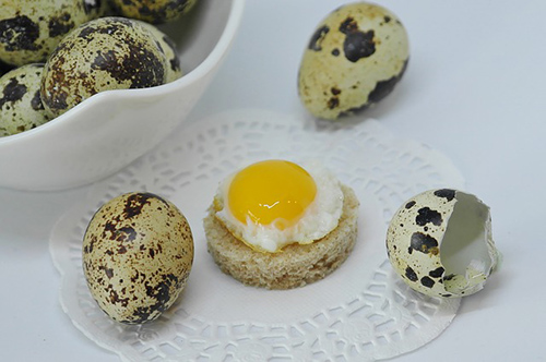 quail eggs with one cracked open