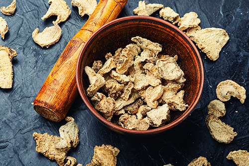 black briony root in wooden bowl