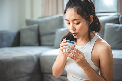 woman sipping tea