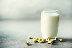 a glass of cashew milk