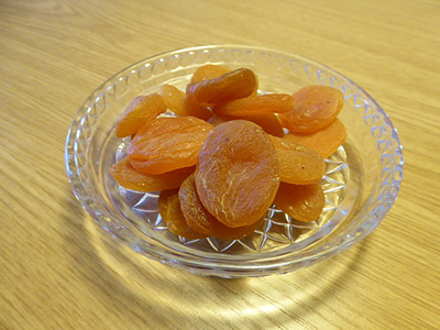 dried apricots in a glass bowl