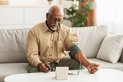 man checking his blood pressure