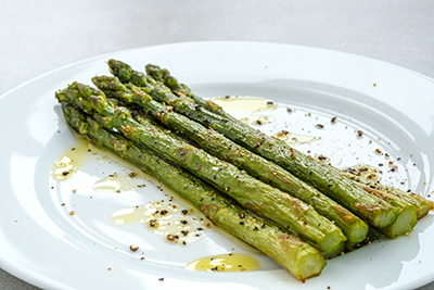 cooked asparagus on a plate