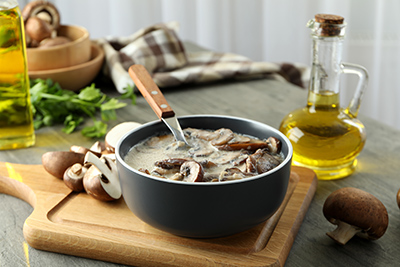 cooked mushrooms in a pot