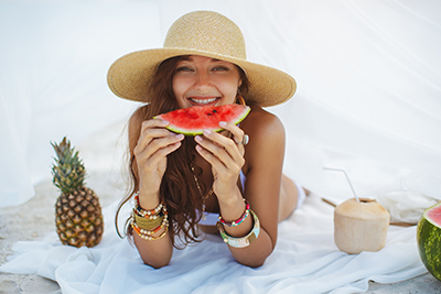 woman eating watermelon