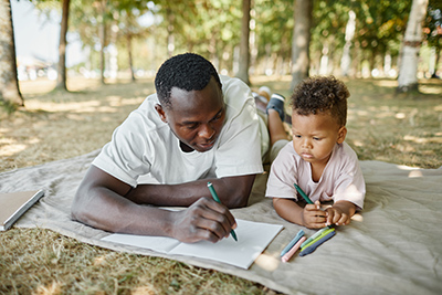 father reading with his son