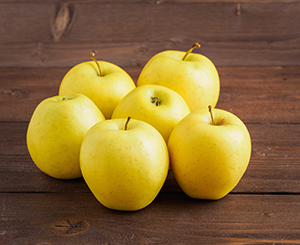 bunch of yellow golden apples