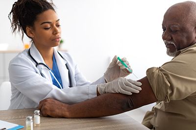 doctor giving patient an injection