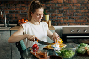 woman preparing vegetarian meal