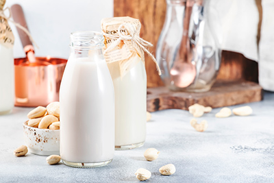 two bottles of cashew milk