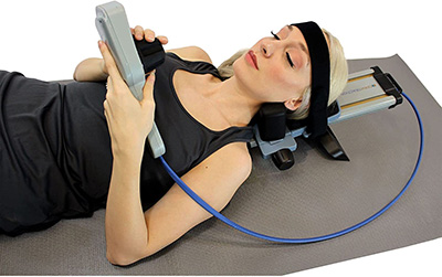 woman using a cervical traction device