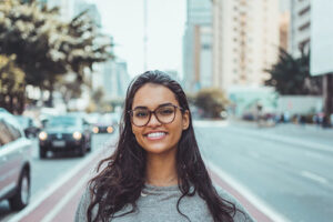 healthy woman with glasses smiling