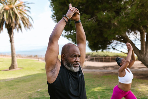 couple exercising in the park