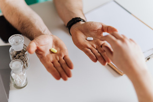 someone having to make a decision between two types of medications