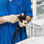 surgeon using an endoscope