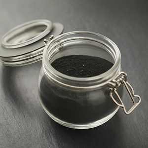 jar filled with charcoal