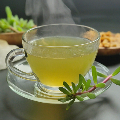 purslane tea in glass teacup