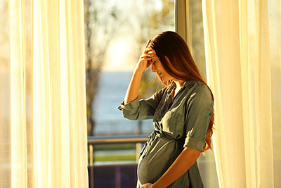 pregnant woman clearly stressed out
