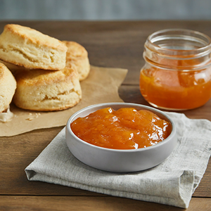 Bowl and jar of apricot marmalade