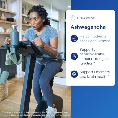Woman working out on stationary exercise bike.
